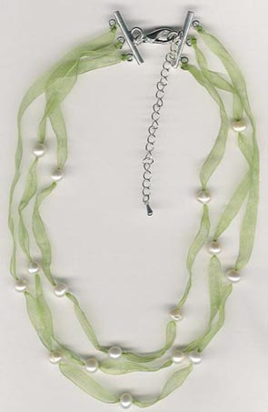 green ribbon and pearl necklace green ribbon and pearl necklace