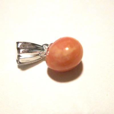 1.35 carat Conch Pearl Light Brownish Pinkon Sterling Silver