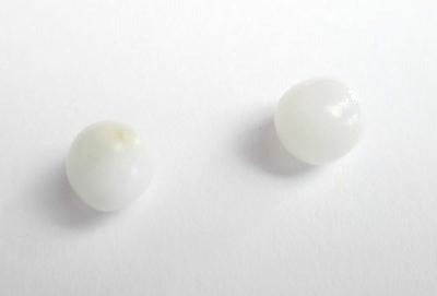 2 Clam Pearls 3+ carats - for Sale