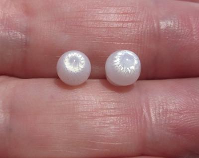 2 Flame Filled Clam Pearls 4+ carats - Total 8mm