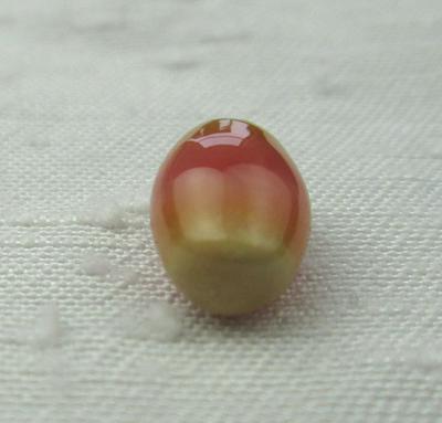 3 carat Pink and Green Conch Pearl 10mm