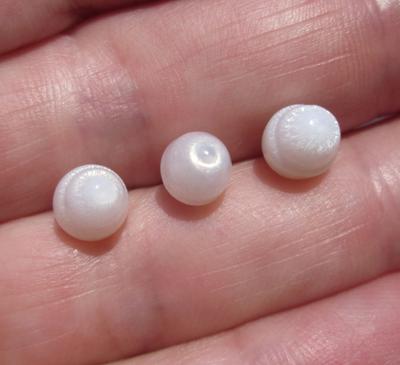 3 Flame Filled Clam Pearls 8 carats Total 9mm 