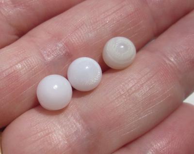 3 Off Round Clam Pearls with Flame 8 Carats Total