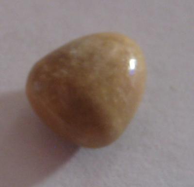 4.6 carat brown triangle conch pearl