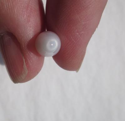 4+ carat Drop Shape Clam Pearl with Silky Flame