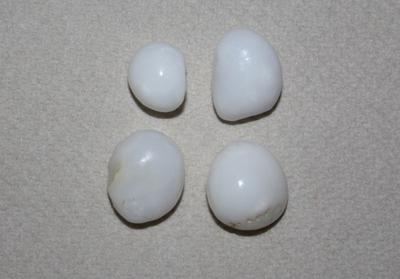 4 Clam Pearls - 46 carats total