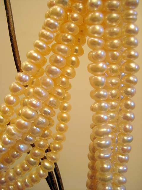 6 strand white pearls closeup