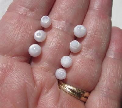 7 Flame Filled Clam Pearls 12 carats Total