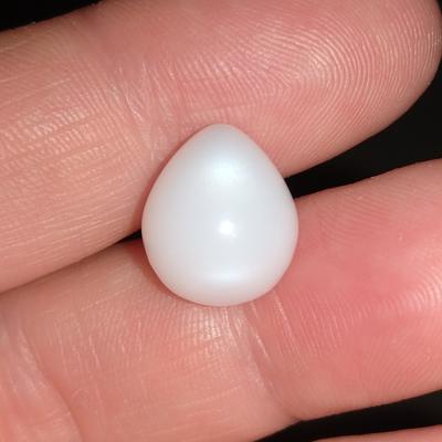 A Clam Pearl Drop of 13+ ct with Flame