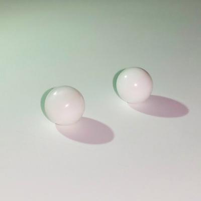 A Pair of White Clam Pearls 5.25 + 5.55 ct