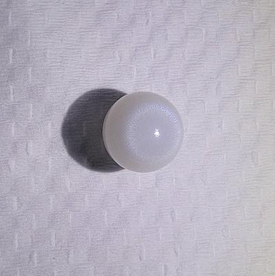 A Round Clam Pearl with Flame 5+ ct