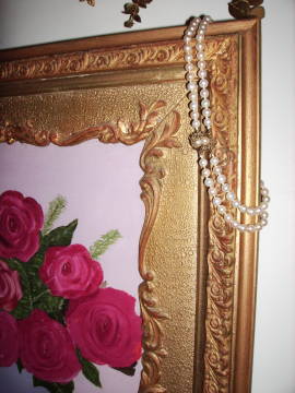 antique pearls and roses in antique frame