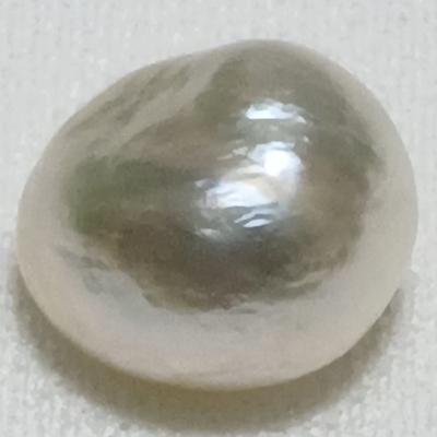 Basra Natural Pearl 6.28 Carat 11mm Button Shape