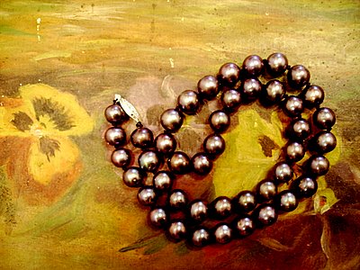 Black pearls with pansy oil painting Black pearls on pansy oil painting