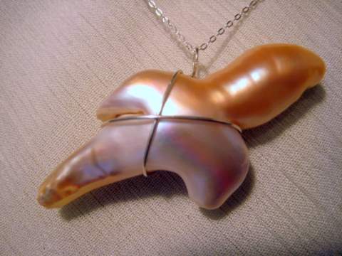 Chinese Fresh Water Pearl Flipper the Dolphin Chinese fresh water pearl flipper the dolphin
