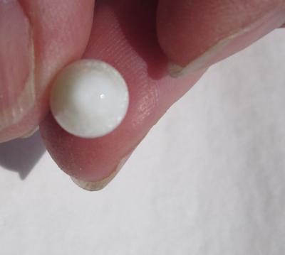 Clam Pearl Egg Shaped 4 carats 11mm with Flame