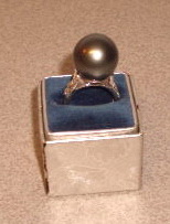 ENORMOUS black pearl set in 18k white gold