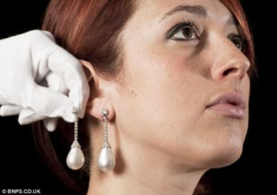 £250,000 per ear: Jewellery expert Marielle Whiting with the unique pearls that lay in a drawer for 35 years  