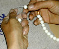 Final Stringing for Shell Pearls