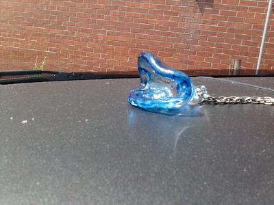 Tiny pearls glued into blown glass 