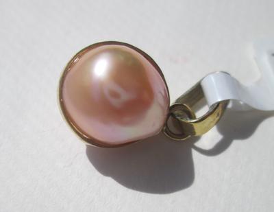 Cultured pink pearl purchased in Mexico - Buyer told it was natural - Buyer Beware!