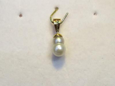 Natural Pearl Pendant 7mm 1+ carat on 18k Gold