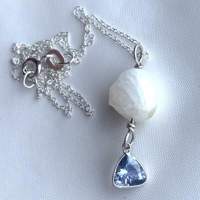 Tanzanite with natural USA freshwater pearl
