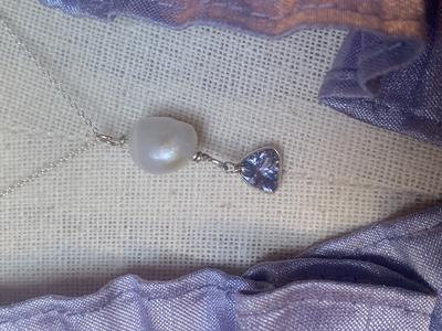 Tanzanite with natural USA freshwater pearl