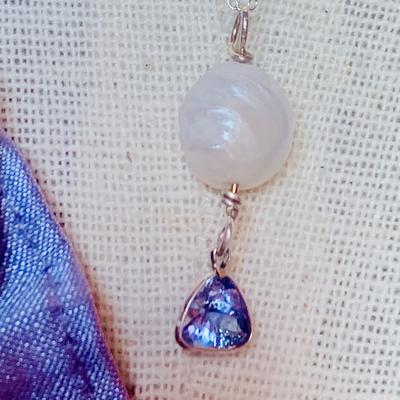 Tanzanite with natural USA freshwater pearl