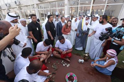 Ambassador of the United Kingdom Belinda Lewis looks on