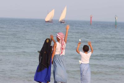 Looking at pearling dhows in Kuwait