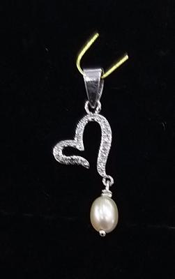 Natural Pearls Heart Pendant With Diamonds.