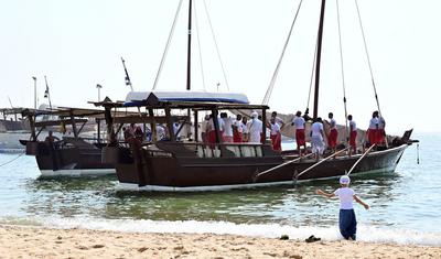 Dhow boats carrying divers attend the inauguration of the 32nd Pearl Diving Festival, Kuwait, (Photo by Asad/Xinhua)