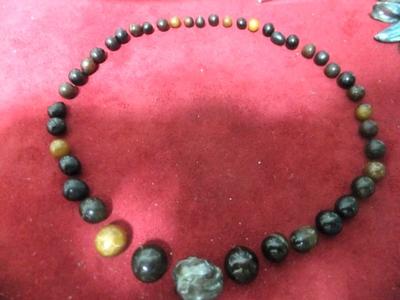 Closeup of pen pearl necklace