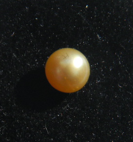 Rare round golden natural pearl