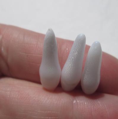 Three Long Drop Shaped Clam Pearls 21-17mm