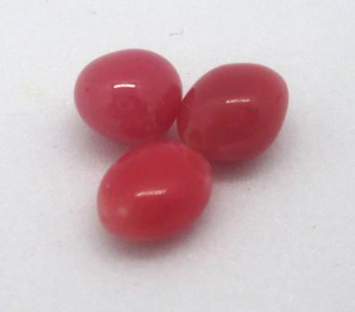 Three Reddish Conch Pearls