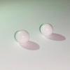 A Pair of White Clam Pearls 5.25 + 5.55 ct