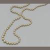 A single strand graduated mostly natural pearls necklace