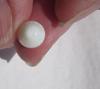 Clam Pearl Egg Shaped 4 carats 11mm with Flame