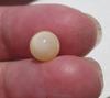 Clam Pearl with Flame 4 carats 12mm