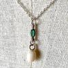 Conch Pearl Necklace with Emerald