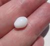 Egg Shaped Clam Pearl 9mm 3+ carats with Flame