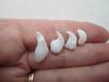 Four Curly Natural Clam Pearls 16 carats Total