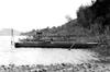   Clam boats lined up along the shoreline of the Mississippi River near Winona.      Winona County Historical Society 