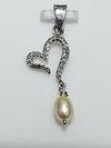 Natural Pearls Heart Pendant With Diamonds.