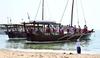 Dhow boats carrying divers attend the inauguration of the 32nd Pearl Diving Festival, Kuwait, (Photo by Asad/Xinhua)