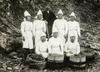Female pearl divers next to Kokichi Mikimoto, inventor of cultivating pearls. Japan, 1921.Nationaal Archief | Wikimedia Commons