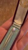 antique platinum stick pin with GIA certified natural saltwater pearl