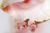Figure 1. “Rosebud” conch pearls of various pink tones ranging from 0.93 to 14.72 ct. Photo by Sood Oil (Judy) Chia. 